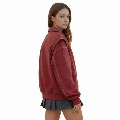 Women's oversized bomber jacket featuring contrast stitching details. 2