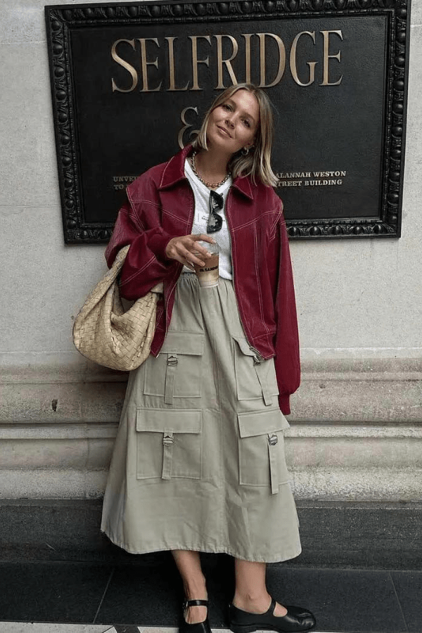 Women's oversized bomber jacket featuring contrast stitching details. 6