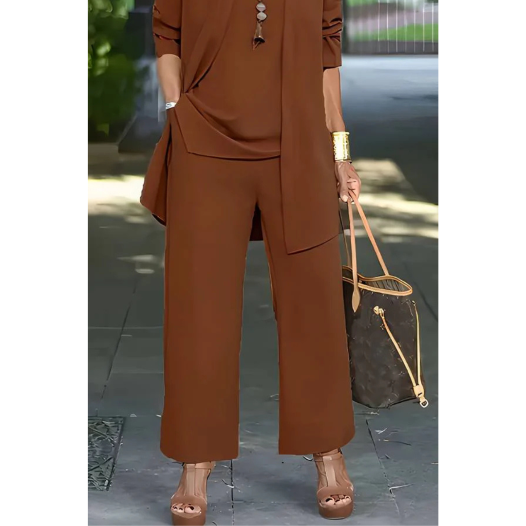 Three-piece women's casual set featuring a top, pants, and cardigan arranged neatly. The top has short sleeves, the pants are full-length, and the 6